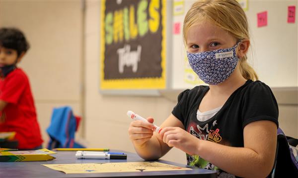 Girl works on Constitution craft